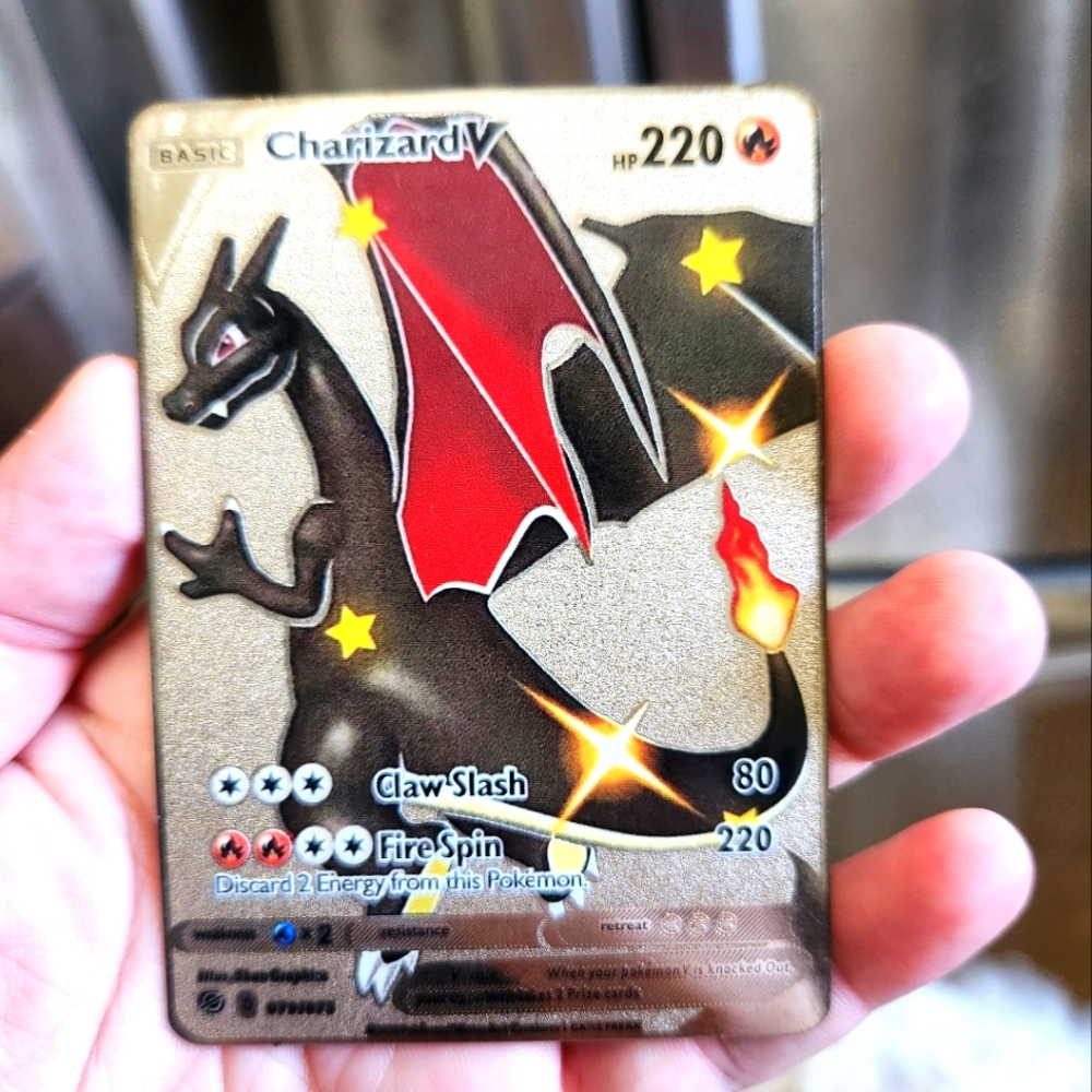 Metallic Pokémon card charizard v